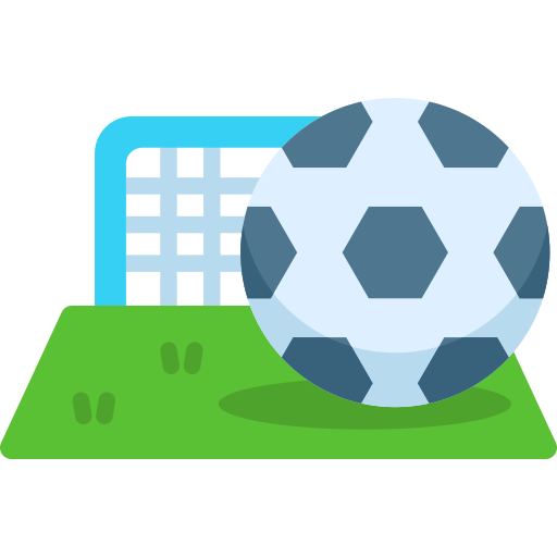 Soccer ball (football) near a goal on the grass. 